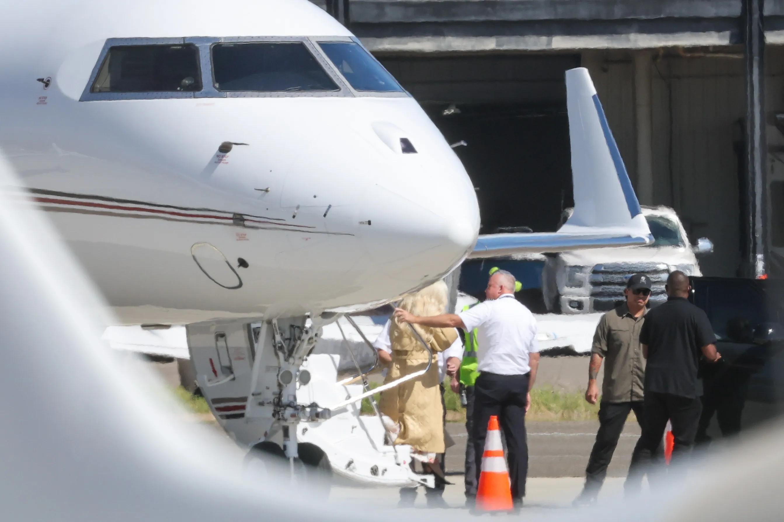 Lady Gaga exiting a private jet in Los Angeles.