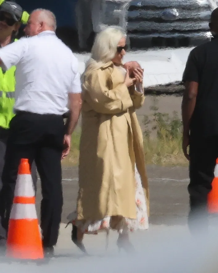 Lady Gaga arriving in Los Angeles with her newborn daughter.