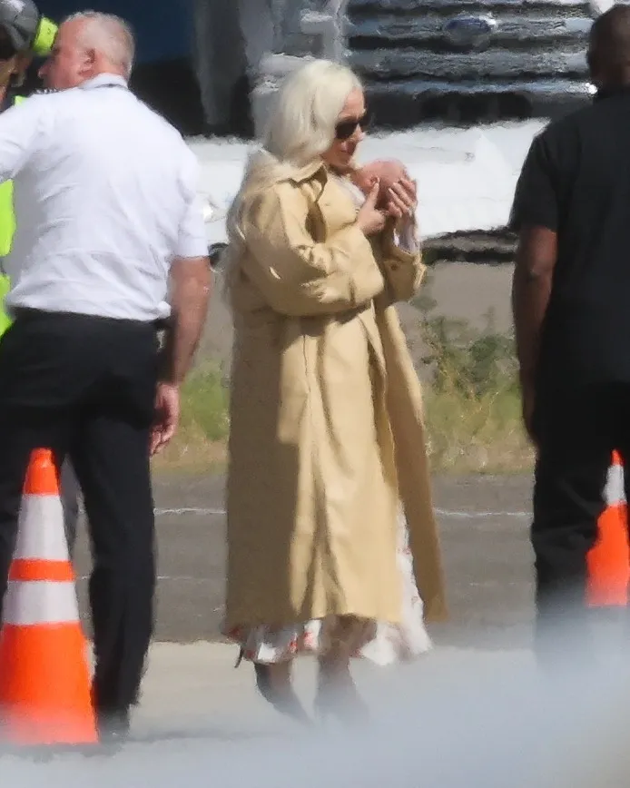 Lady Gaga holding her newborn daughter in Los Angeles.