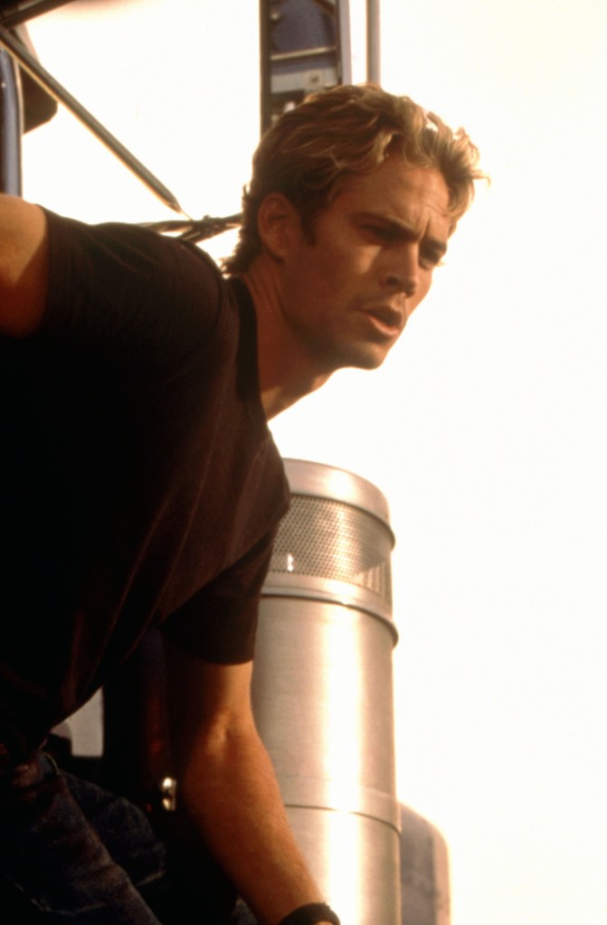 Paul Walker in a close-up looking to the right.