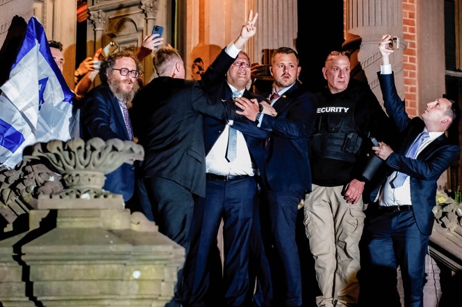 Israeli National-Security Minister Itamar Ben-Gvir interacting with protesters outside of an event