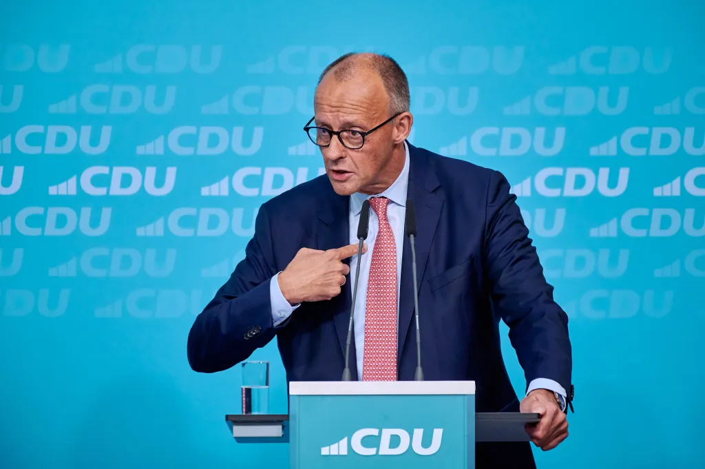 Federal Chancellor Friedrich Merz speaking at the CDU's final election campaign rally.