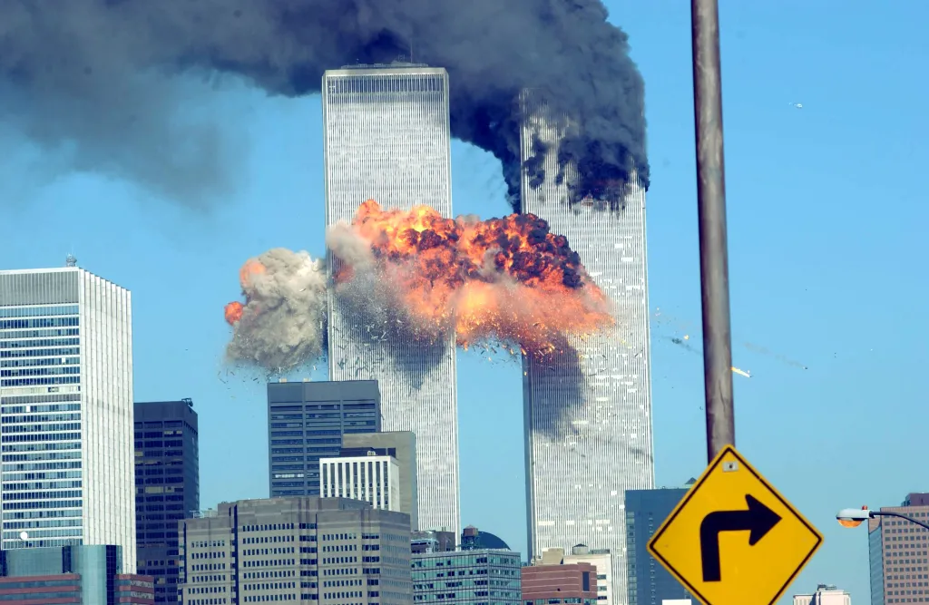 Fiery explosion erupting from the World Trade Center towers.