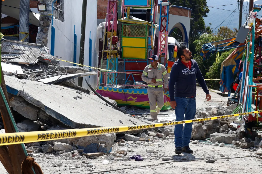 Firefighters inspect the area destroyed by a fireworks explosion by Santa María Canchesdá church in Temascalcingo, Mexico.