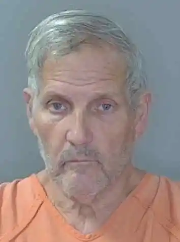 Mugshot of John Herb Hayes.