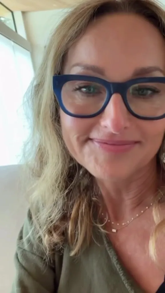 Giada De Laurentiis in blue glasses.