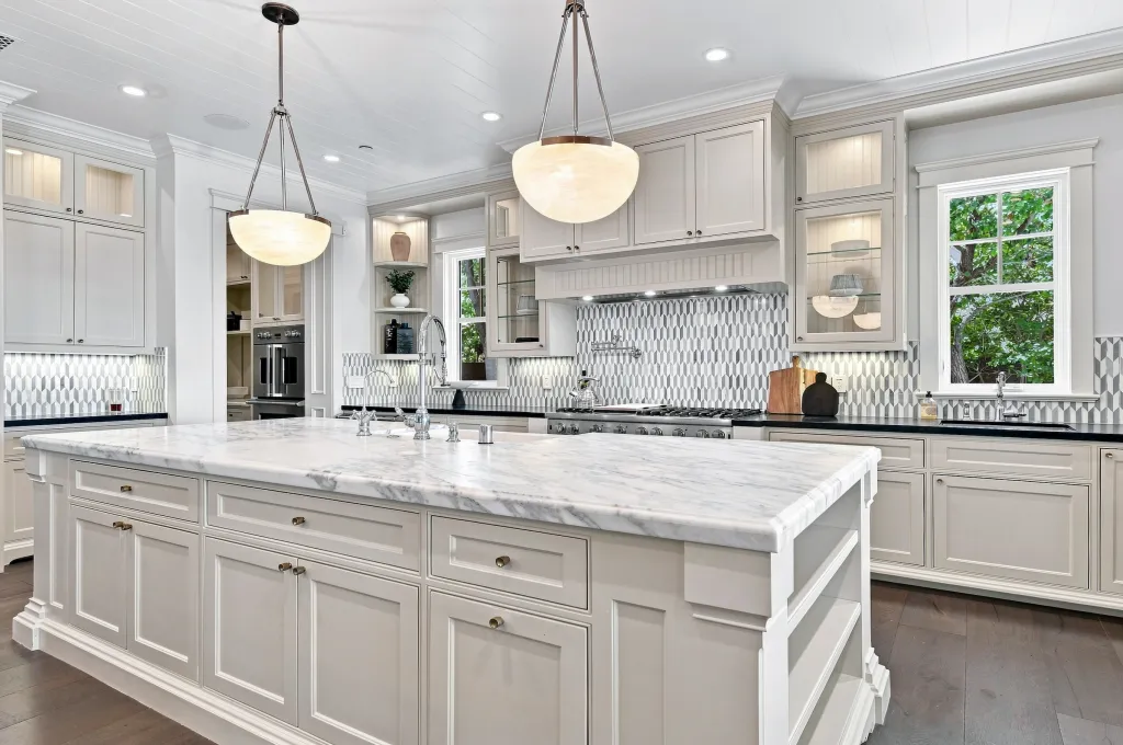A large chef's kitchen anchors the home.