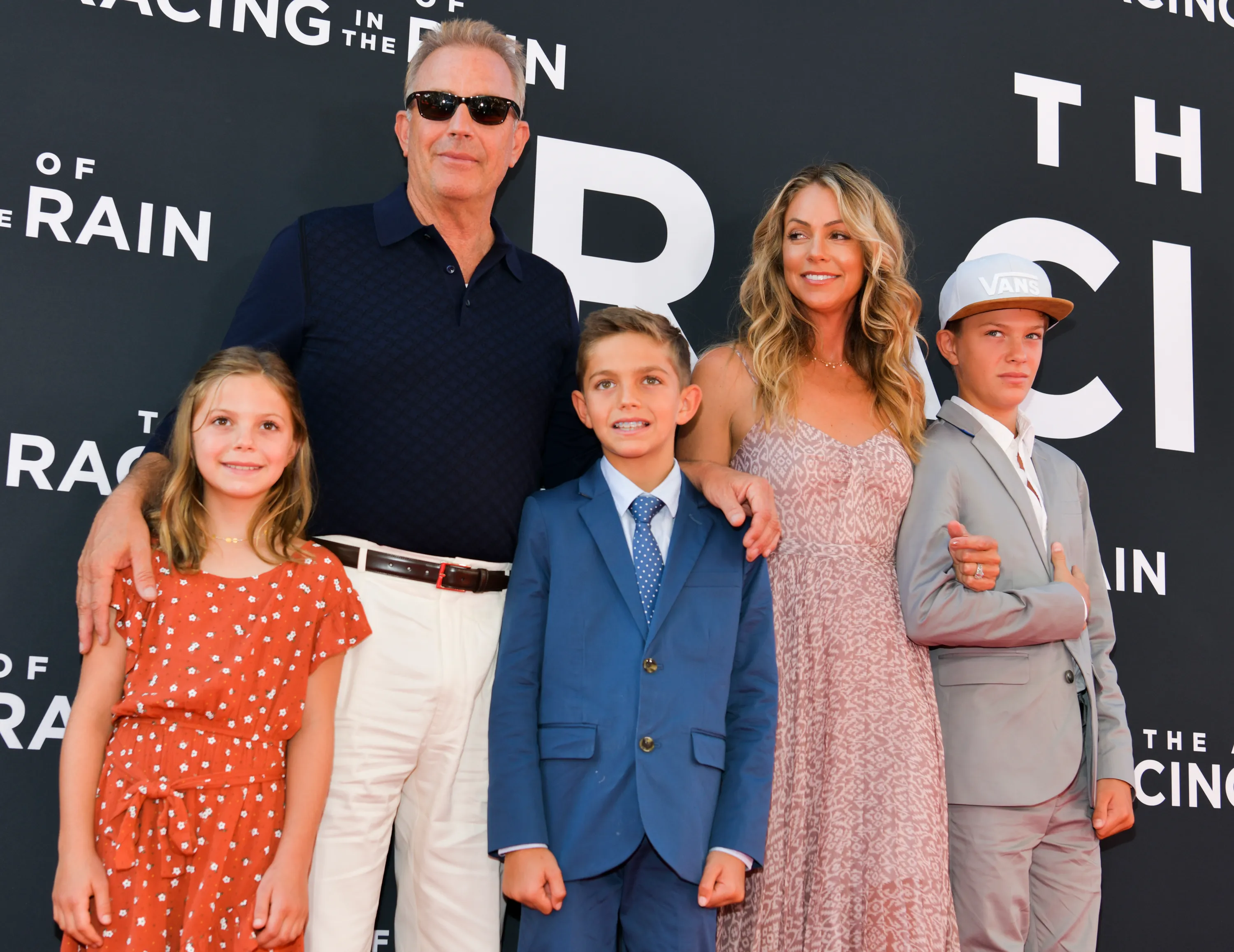 Kevin Costner and Christine Baumgartner pose with their children Grace, Hayes, and Cayden at