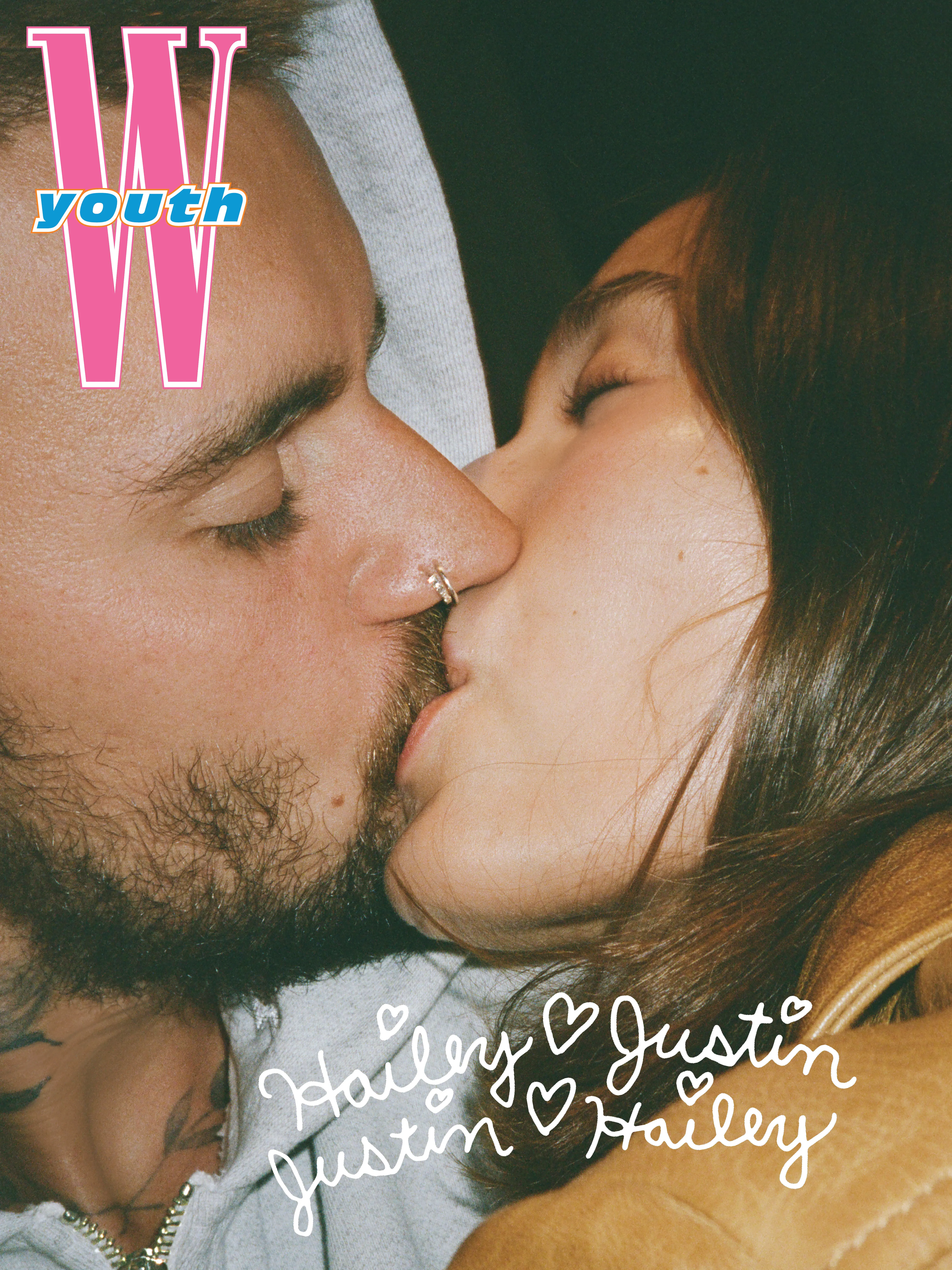 Hailey and Justin Bieber kissing on the cover of W Youth's inaugural issue.