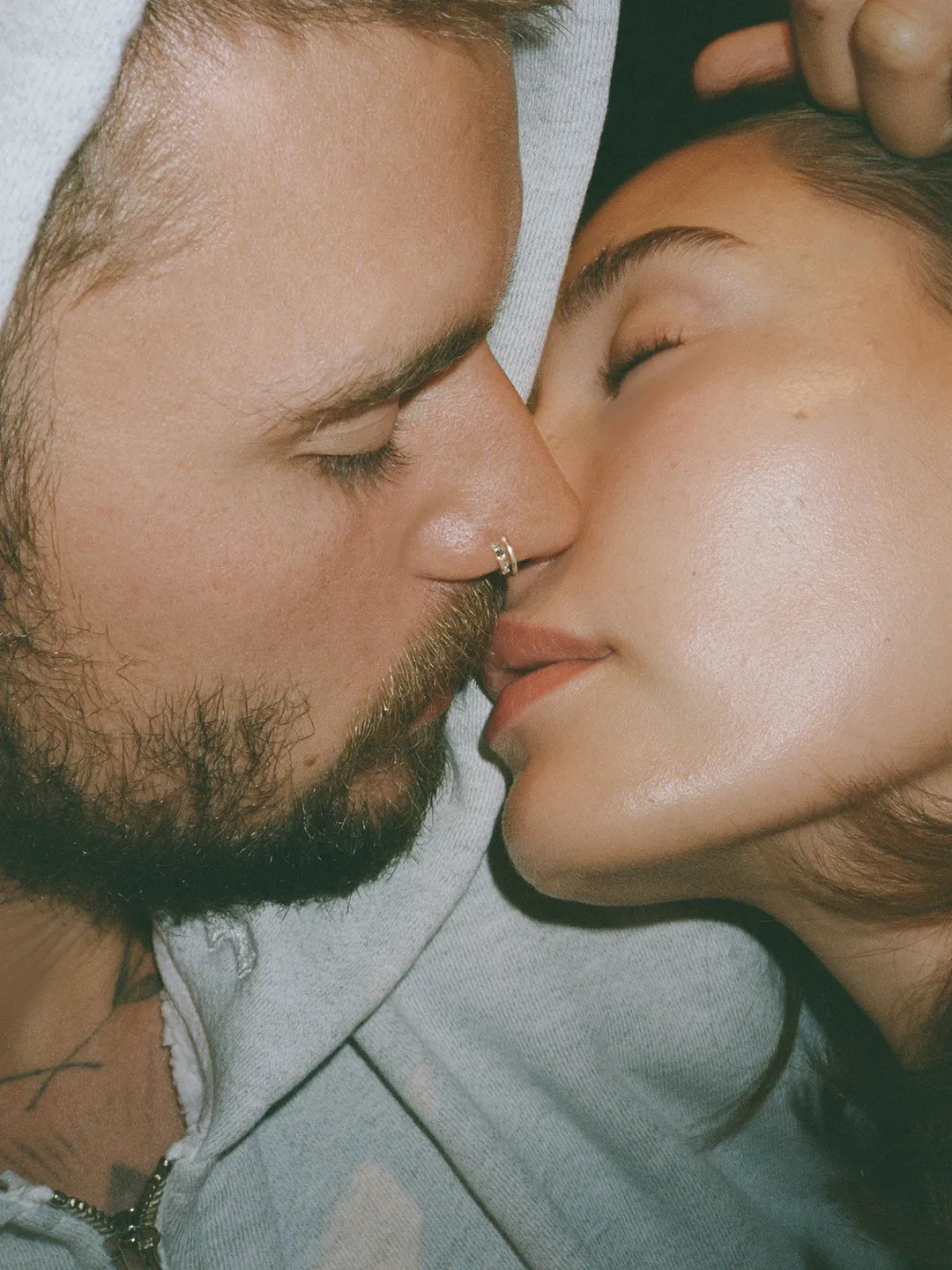 Justin and Hailey Bieber kissing.