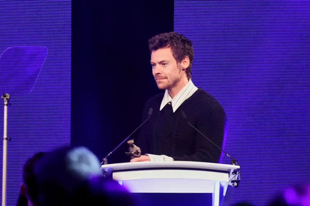 Harry Styles presenting an award at the 71st Ivor Novello Awards.