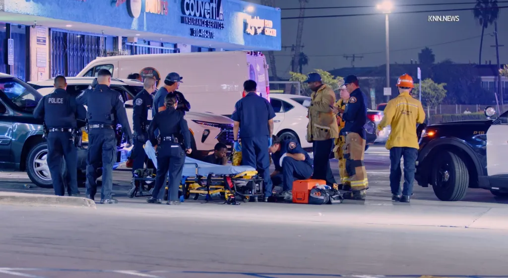 Law enforcement and emergency services personnel respond to a shooting near Crenshaw Boulevard and Rosecrans Avenue in Hawthorne, California.