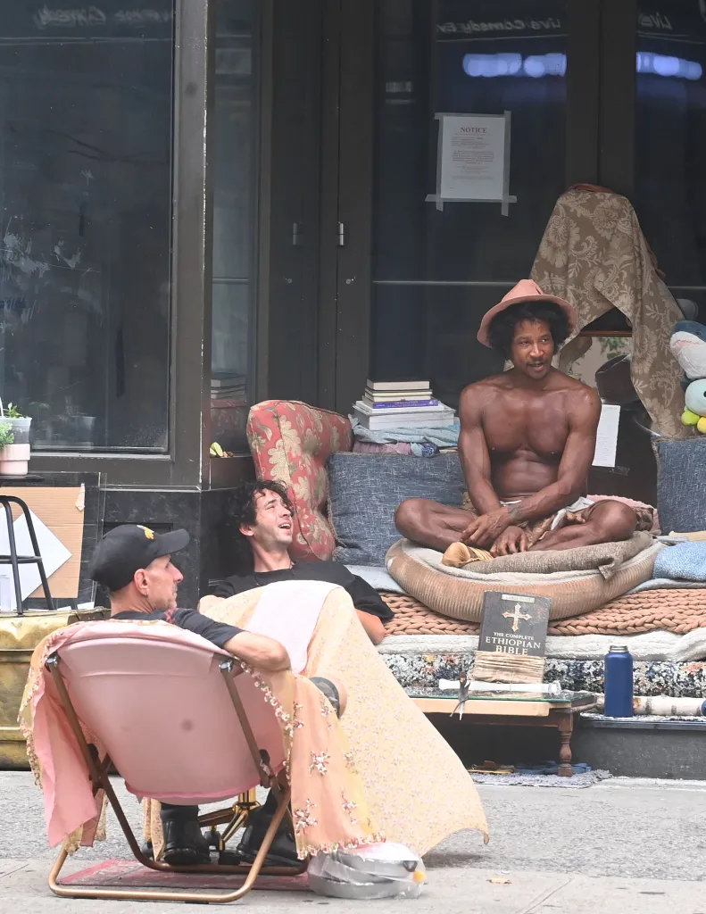 Homeless men “Tiger” and other vagrants in a bedroom-style encampment on Bleecker and Sullivan Streets.