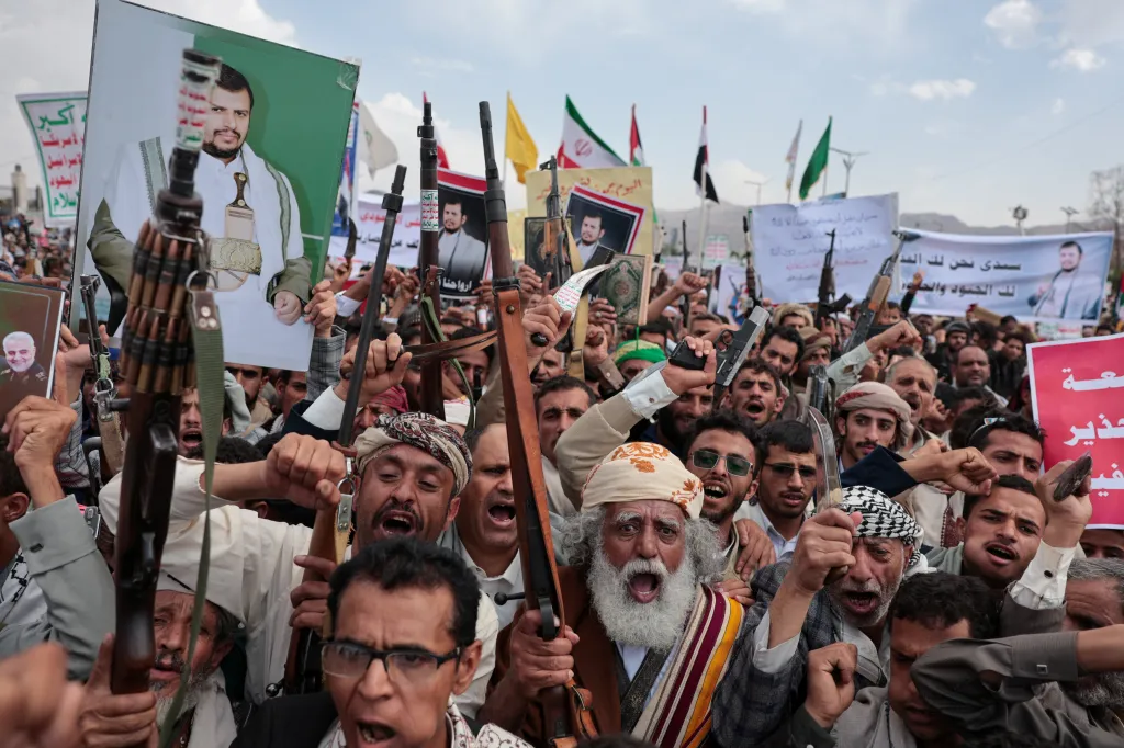 Houthi supporters in Sanaa, Yemen, rally against the Saudi-led coalition's restrictions on Houthi-controlled areas, which the group describes as a blockade.