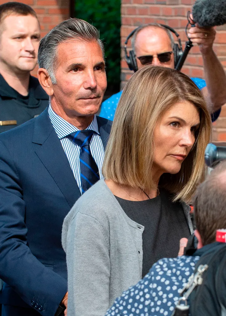 Actress Lori Loughlin and husband Mossimo Giannulli leave the Boston Federal Courthouse.