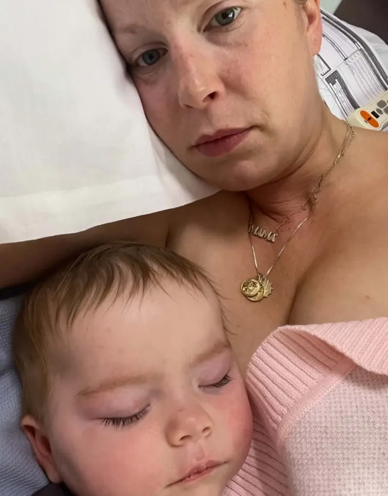 Sophie Dumas with her daughter Sienna in a hospital after Sienna's MRI.