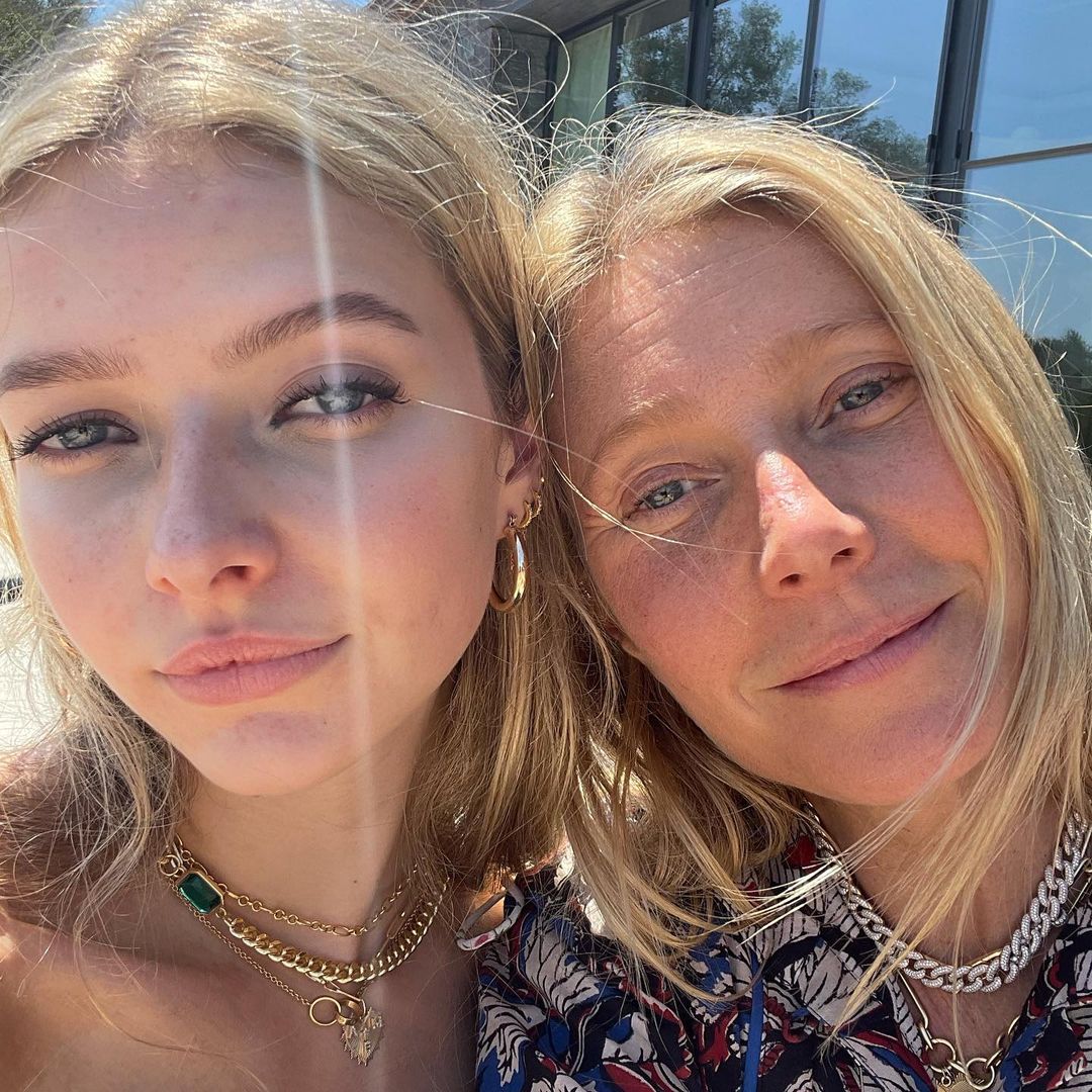 Apple Martin and Gwyneth Paltrow posing together.