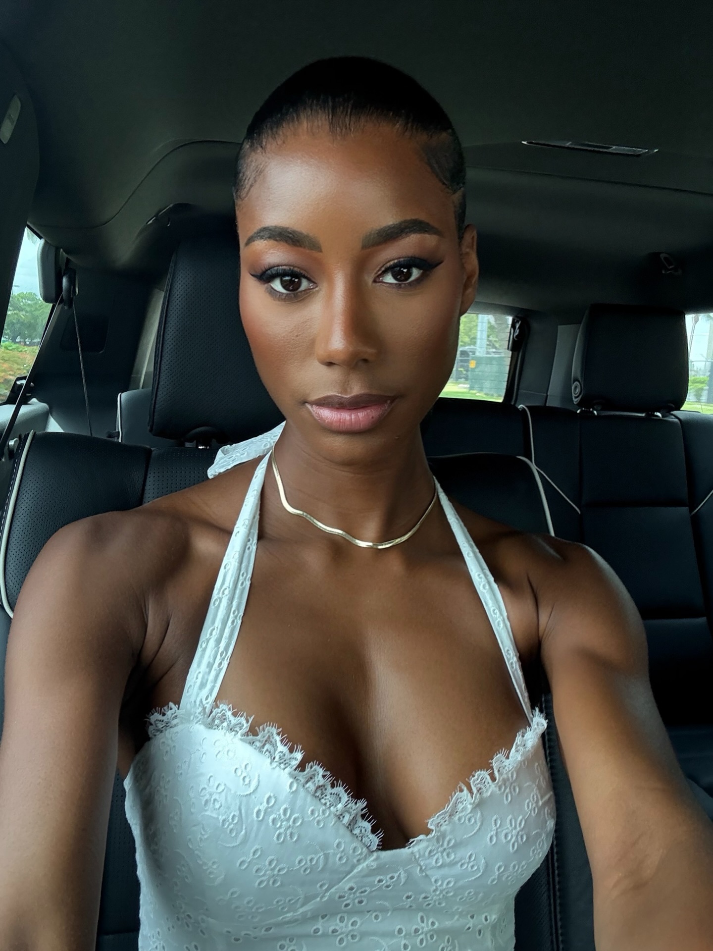 Jazzma Kendrick in a white halter top.