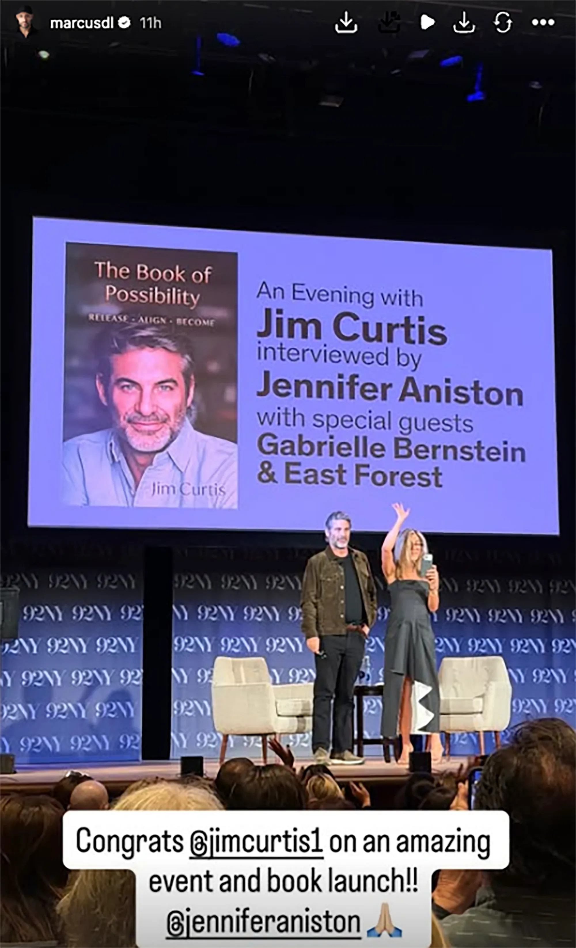 Jim Curtis and Jennifer Aniston on stage at Curtis's book launch event.