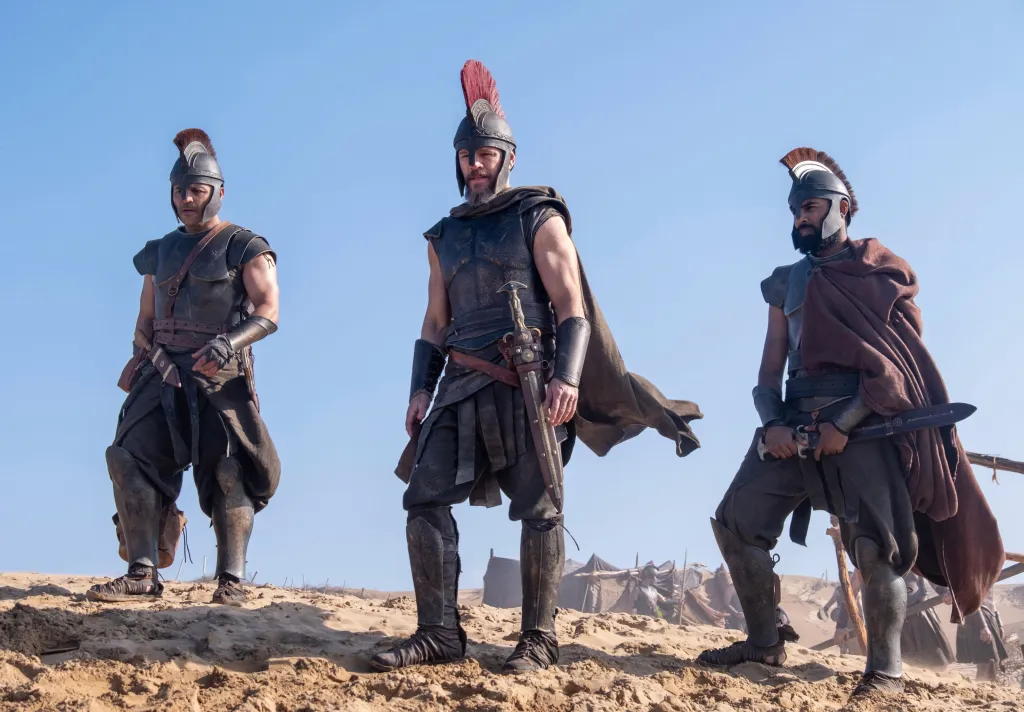 Jimmy Gonzales, Matt Damon, and Himesh Patel in costumes for 