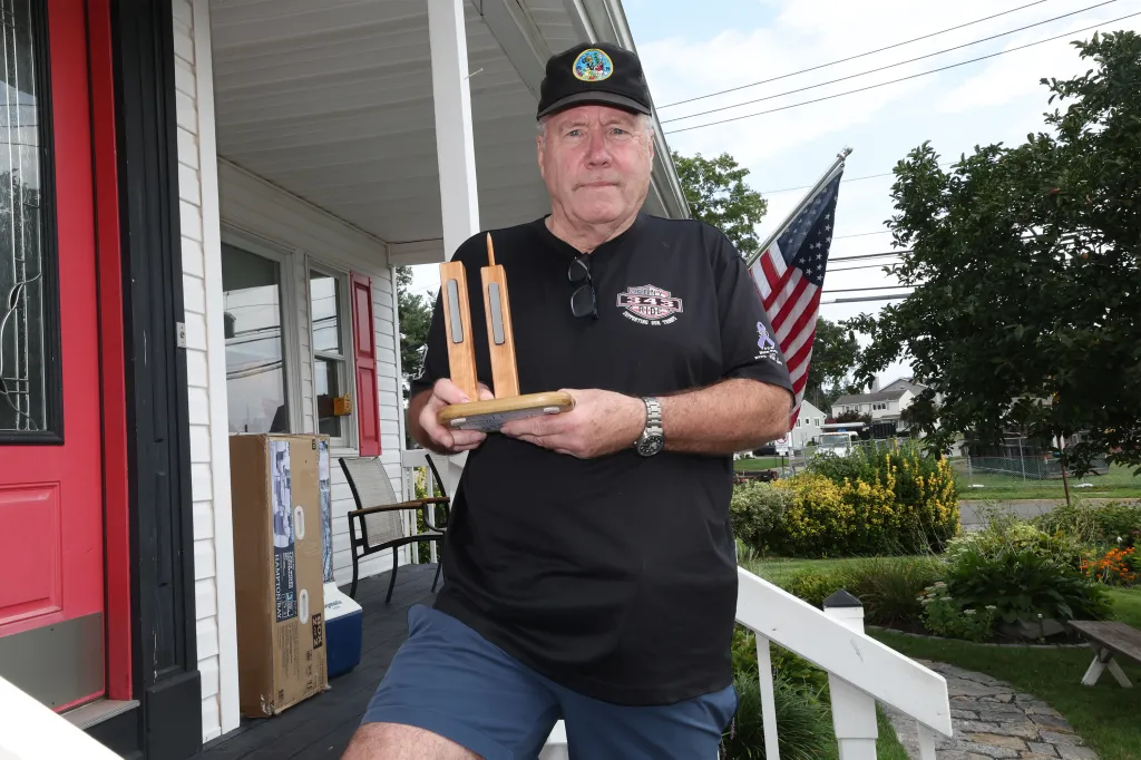 Retired FDNY Battalion Chief and 9/11 first responder John Ricketts builds models of the twin towers with recovered metal from the site at his Long Island home on Thursday, August 27, 2026. Ricketts shares the models with his friends.