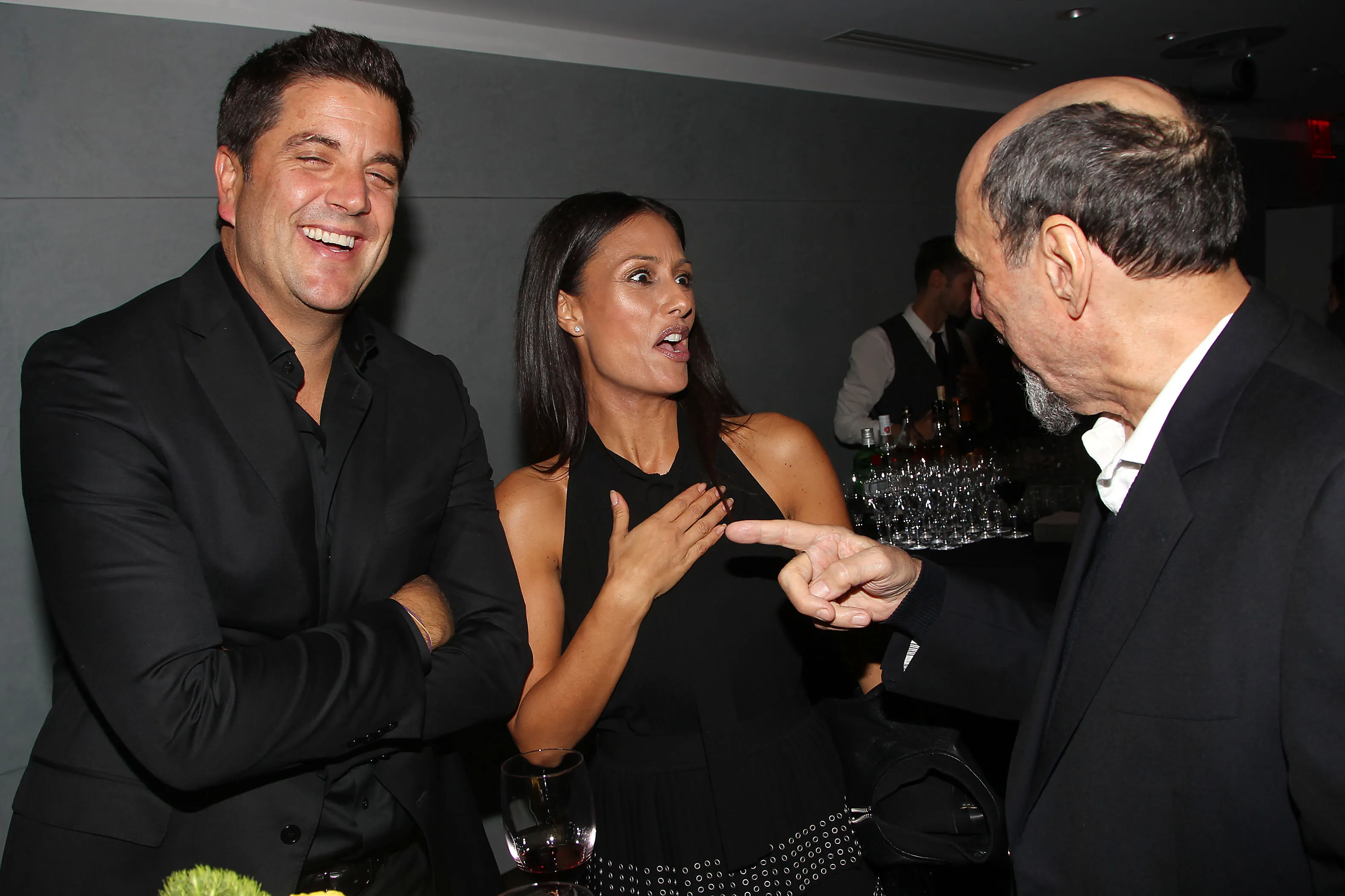 Josh Elliott, Liz Cho and F. Murray Abraham laughing at PaleyFest.