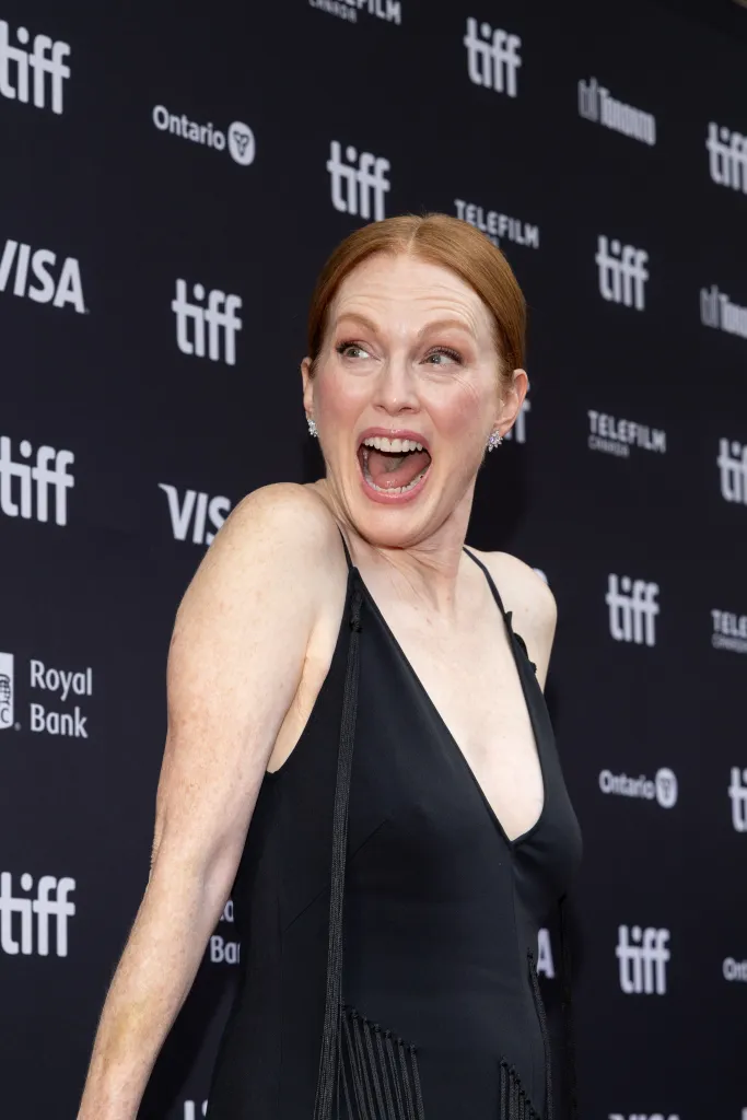 Julianne Moore makes a funny face, mouth open, on the red carpet at the 2026 Toronto International Film Festival.