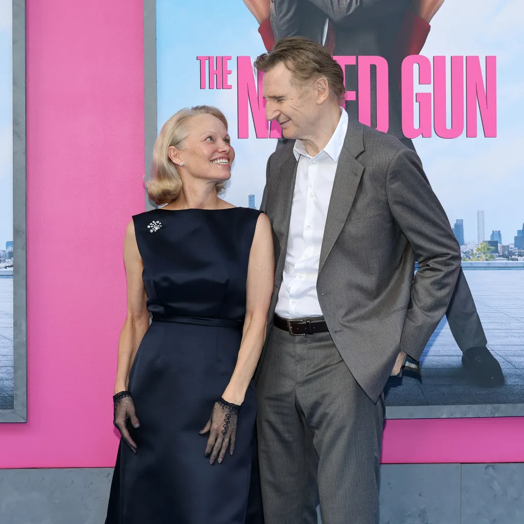 Pamela Anderson and Liam Neeson attend 