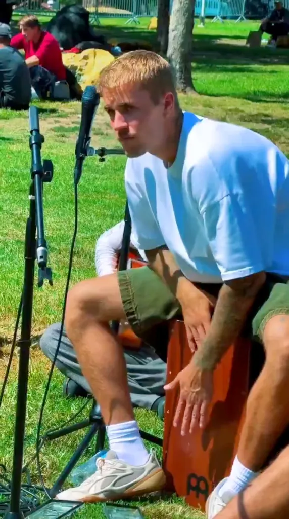 Justin Bieber playing a cajón in MacArthur Park.