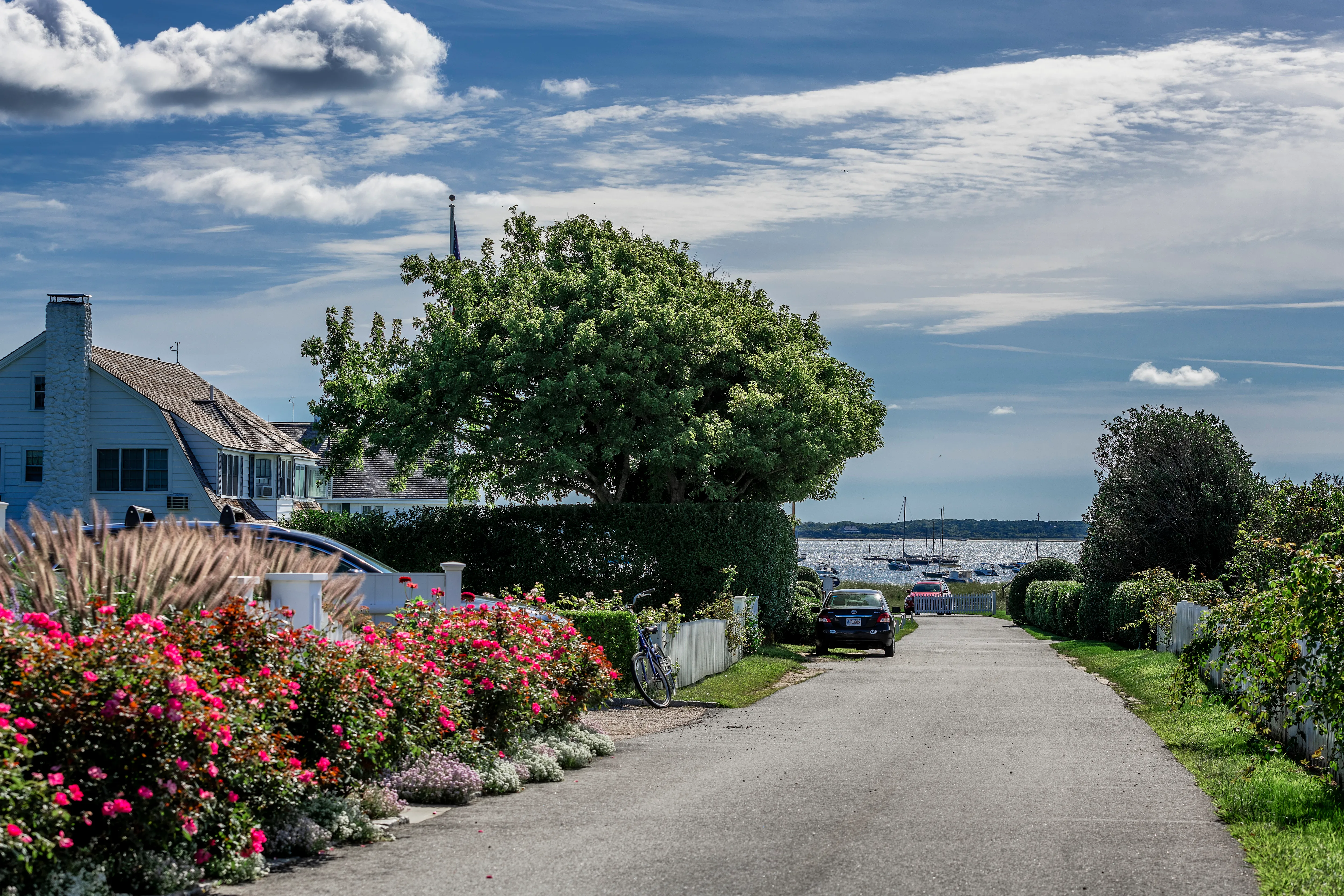 The Kennedy Compound in Hyannis Port, Massachusetts, featuring a coastal home and road leading to the water.