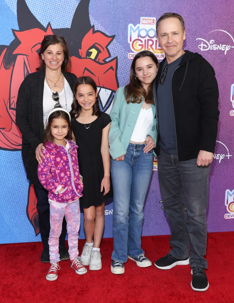 Chad Lowe, Kim Painter, and their children pose on the red carpet.