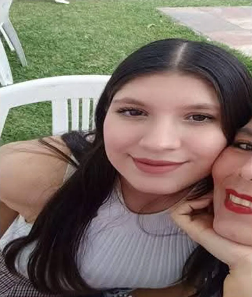 Kimberly Joselín Ramos Beltrán smiles, with another person's face next to hers.