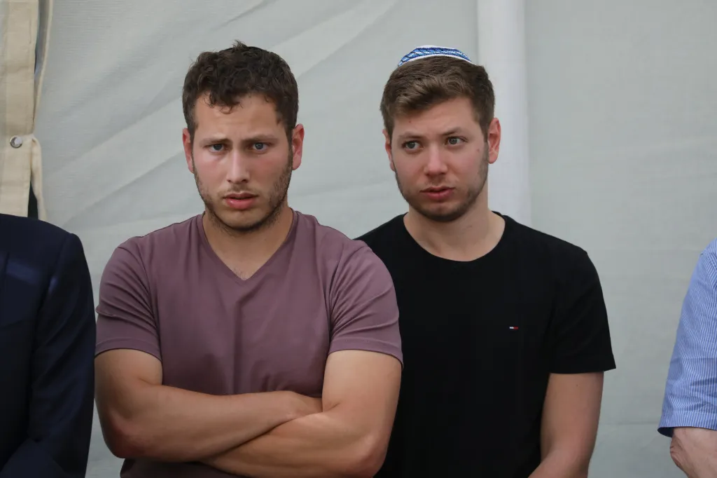 Avner Netanyahu (left) and Yair Netanyahu at a memorial service.