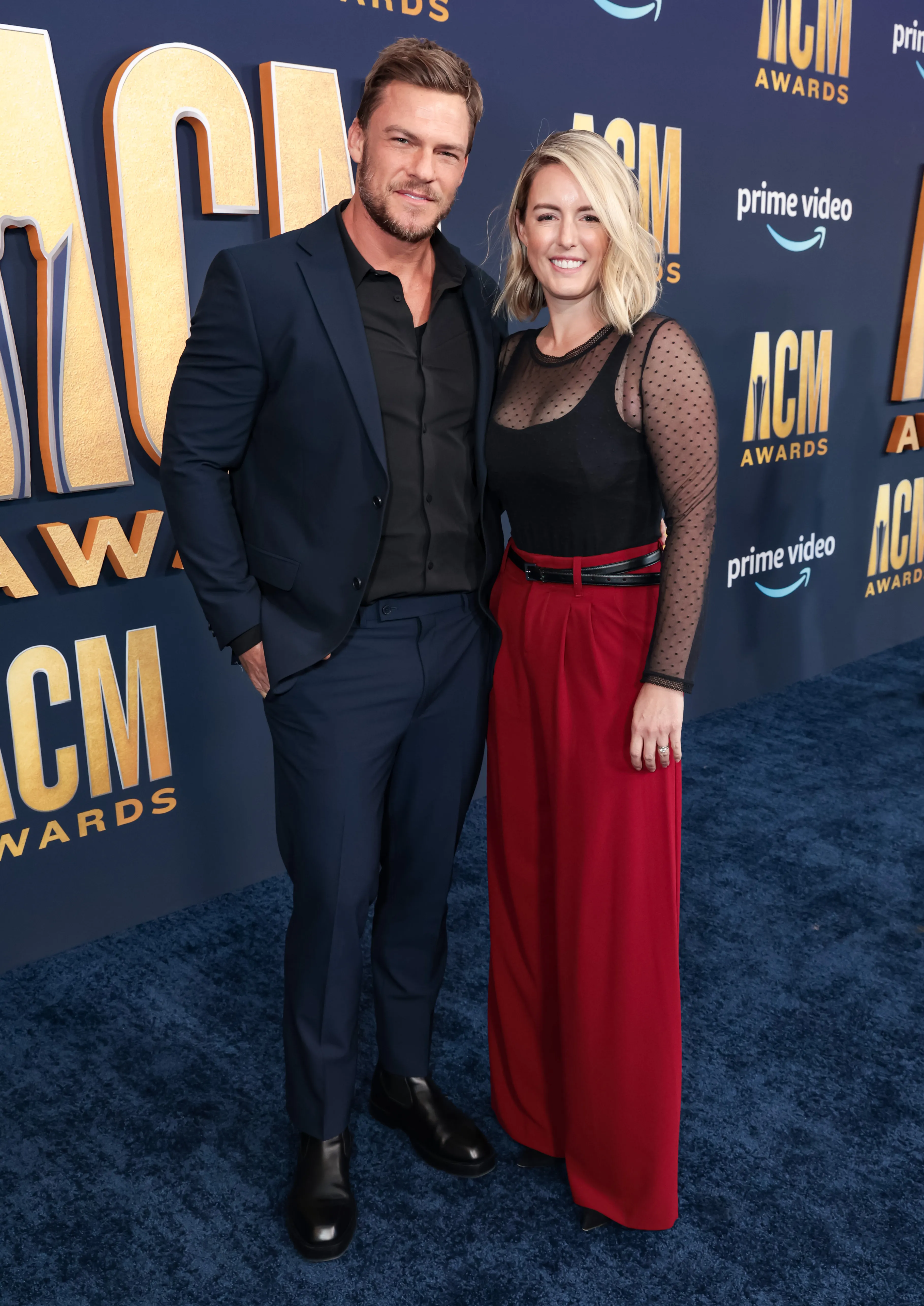 Alan Ritchson and Catherine Ritchson attending the 57th Academy of Country Music Awards.