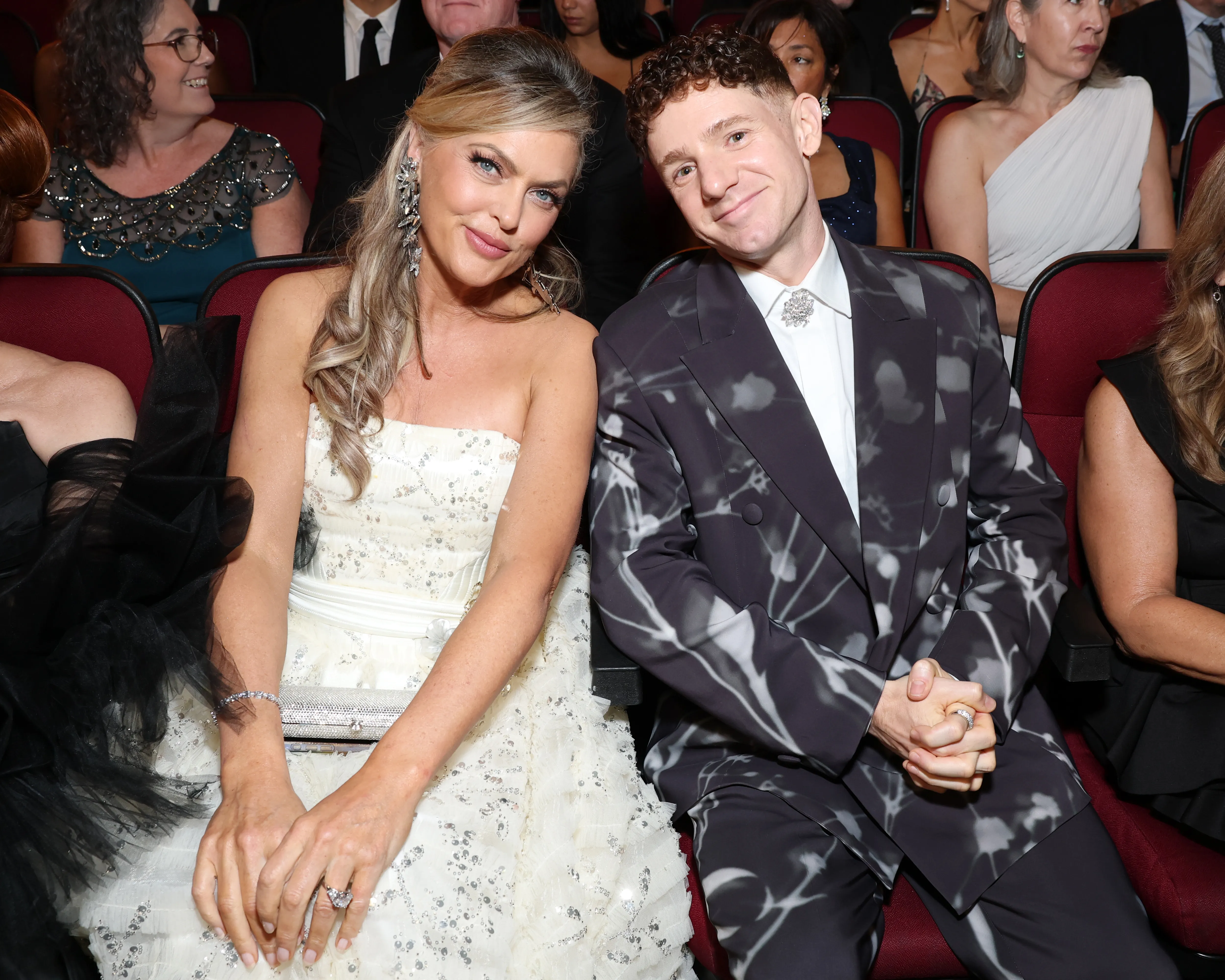 Elaine Hendrix in a white gown and Chris Perfetti in a patterned suit at the 78th Primetime Emmy Awards.