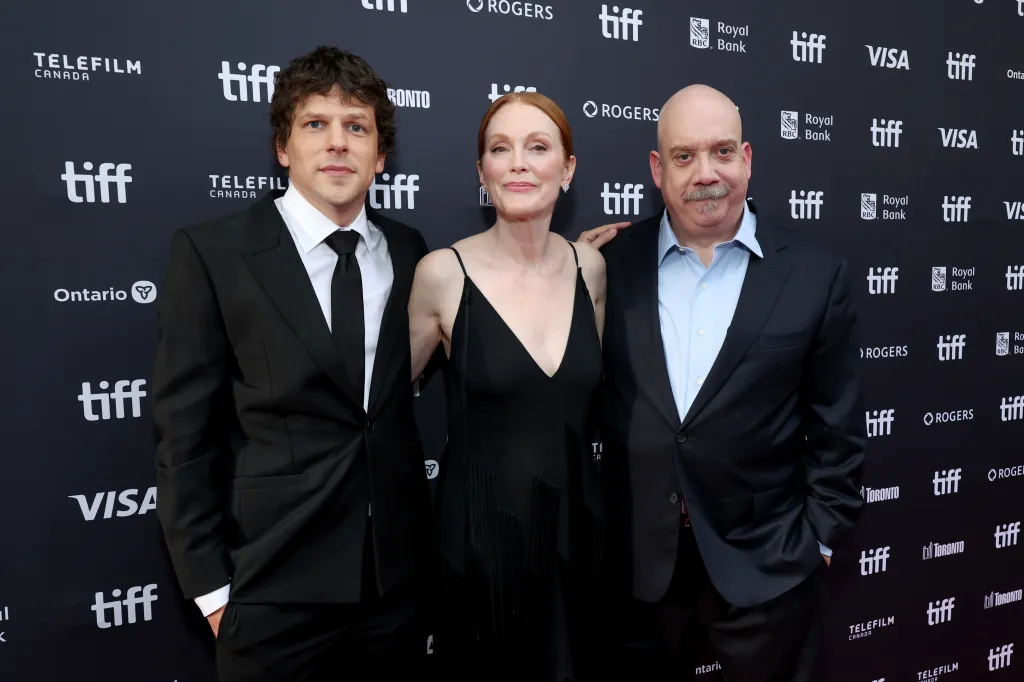 Jesse Eisenberg, Julianne Moore, and Paul Giamatti at the premiere of 