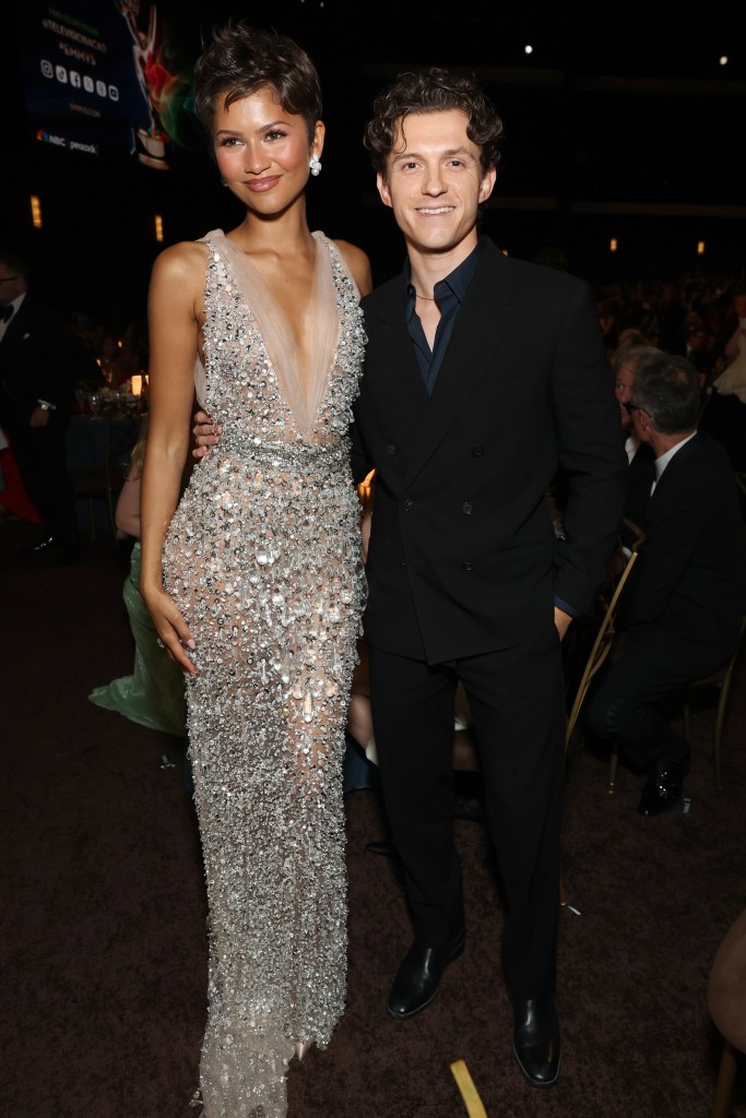 Zendaya in a sparkling gown and Tom Holland in a suit attending the 78th Primetime Emmy Awards.