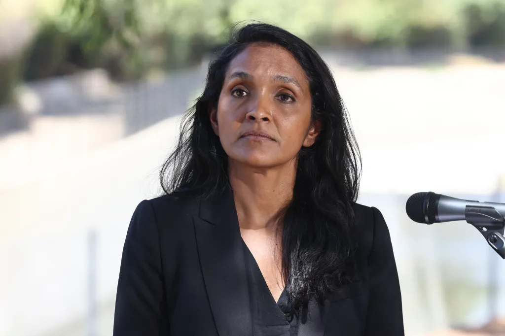 Nithya Raman speaking at a press conference.
