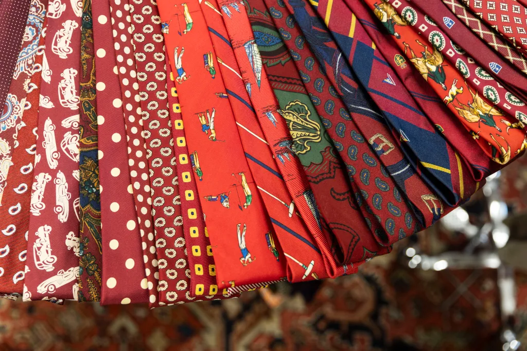 A collection of Ralph Lauren ties with various patterns and colors.