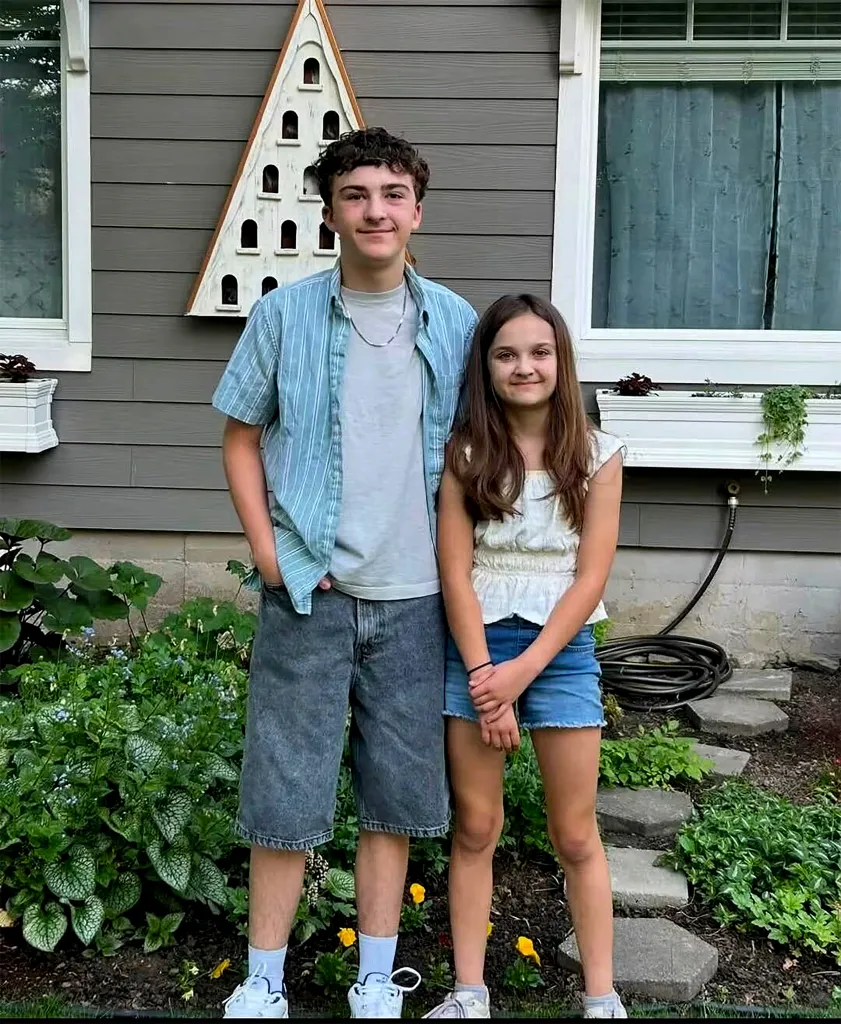 Landon and Charlotte Ghekiere pose for a photo.