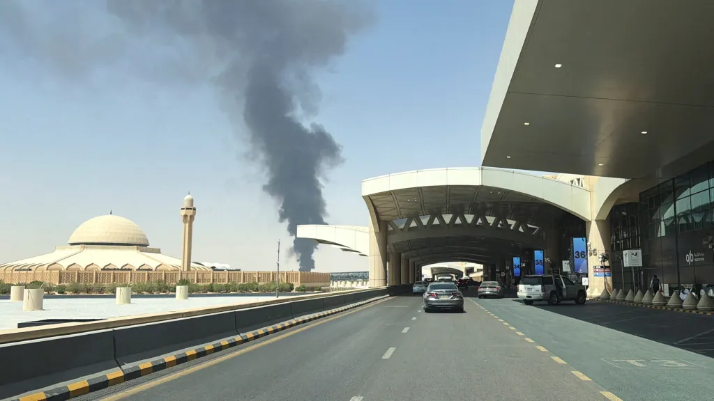 A large plume of black smoke rises from the fuel storage depot at King Khalid International Airport in Riyadh, Saudi Arabia, on Sept. 19, 2026.