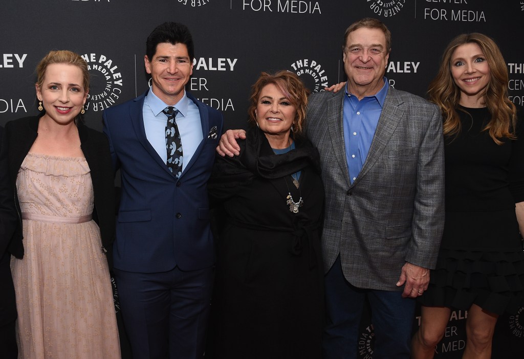 Lecy Goranson, Michael Fishman, Roseanne Barr, John Goodman, and Sarah Chalke smiling at the Paley Center for Media.