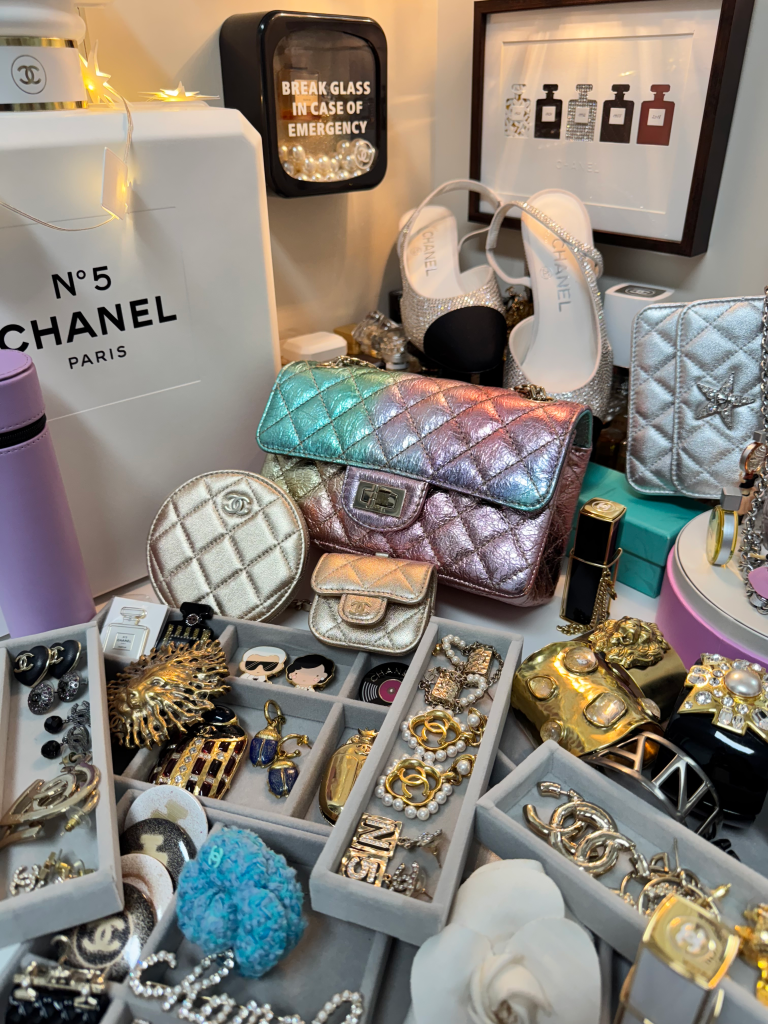 A collection of Chanel clothing, handbags, shoes, and jewelry.