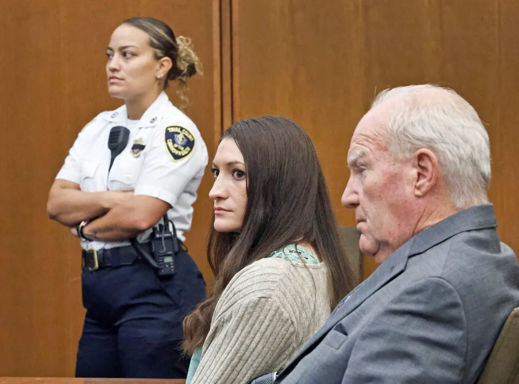 Lindsay Clancy looks at jurors as Judge Sullivan asks them to begin deliberations in her triple murder trial.