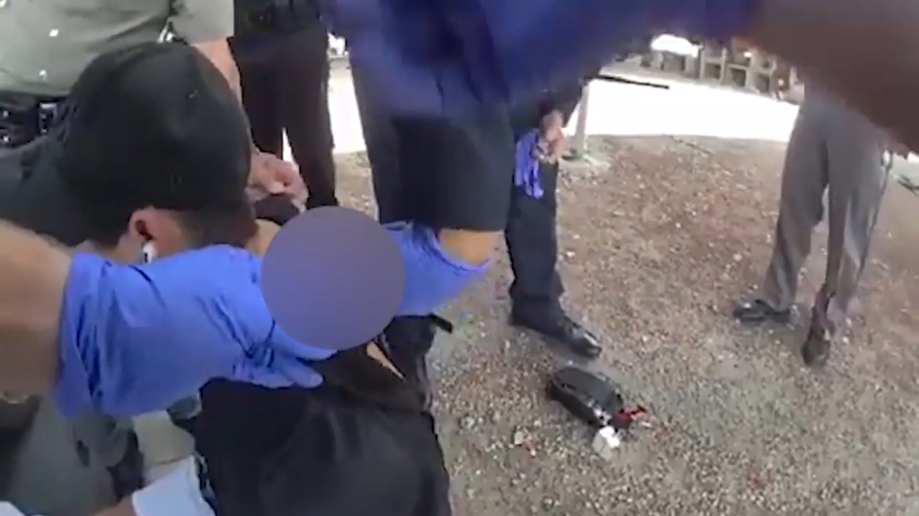 An officer was heard in body camera footage ordering someone to get a pair of shears to cut open Garces Perez's shirt to examine his wounds.