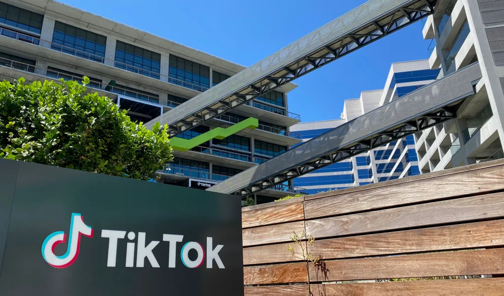 The TikTok logo on a sign in front of the company's new office building.