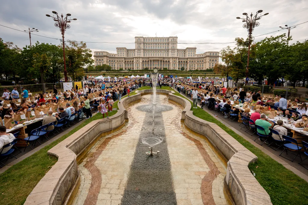 People sitting at a long 