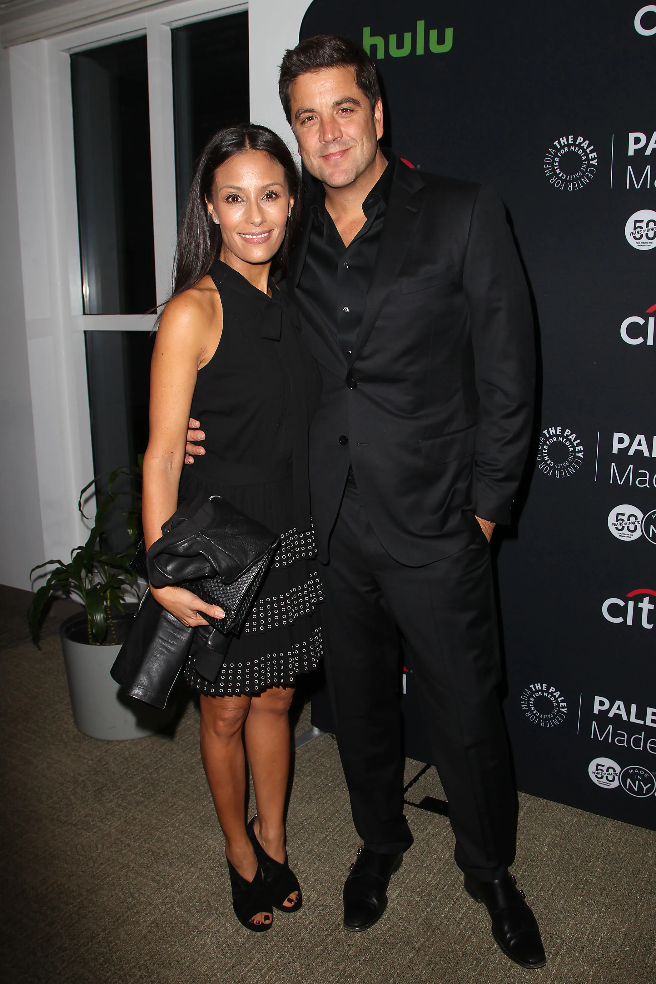 Josh Elliott and Liz Cho posing together at PaleyFest.