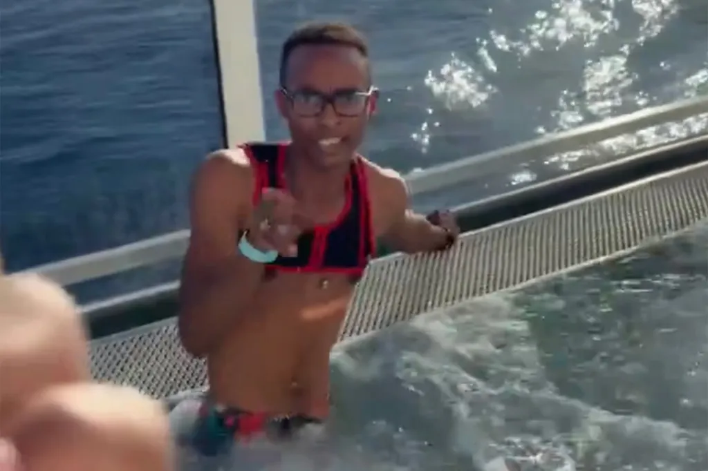 Armonte Domious Wilson in a hot tub on a cruise ship.