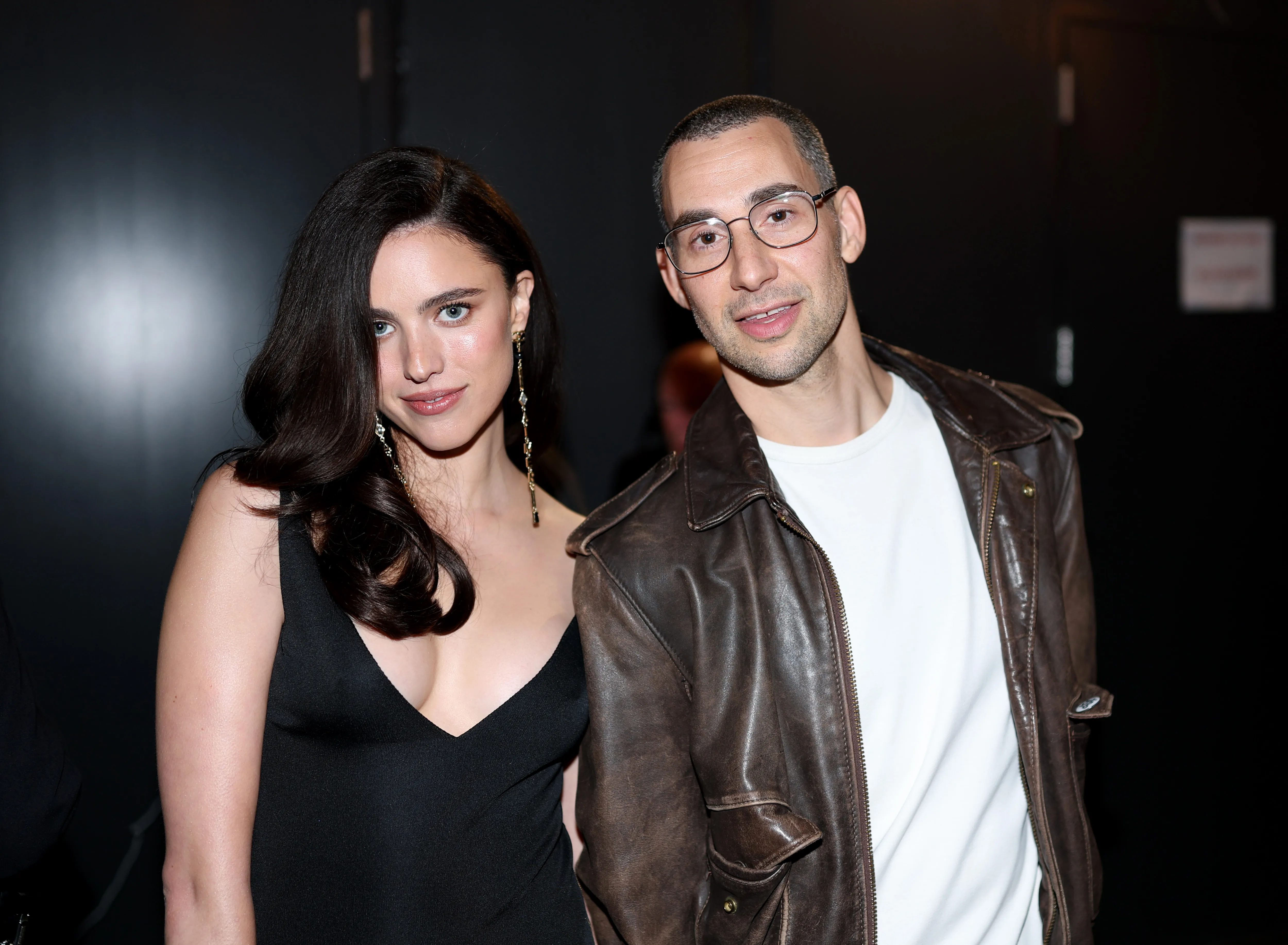 Margaret Qualley and Jack Antonoff pose for a photo.